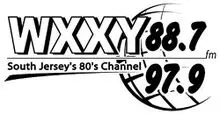 A black and white logo for the wxxy 8 0 's channel.