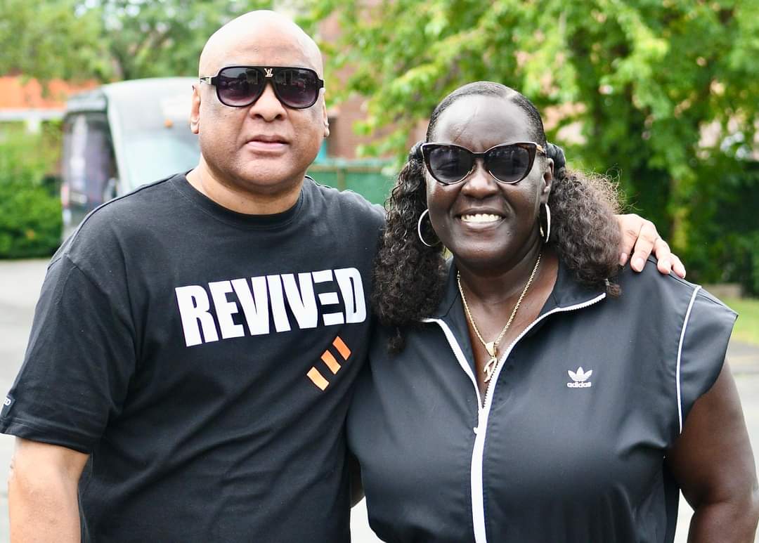 A man and woman posing for the camera.